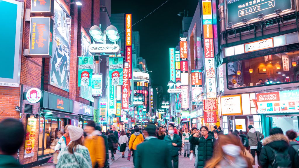 Blurred people walking in Shibuya street , Japan